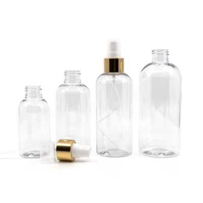 Plastová fľaša priehľadná okrúhla, biely rozprašovač, zlatá lesklá obruč, 100 ml